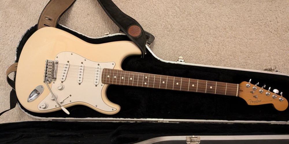 A white Fender Stratocaster